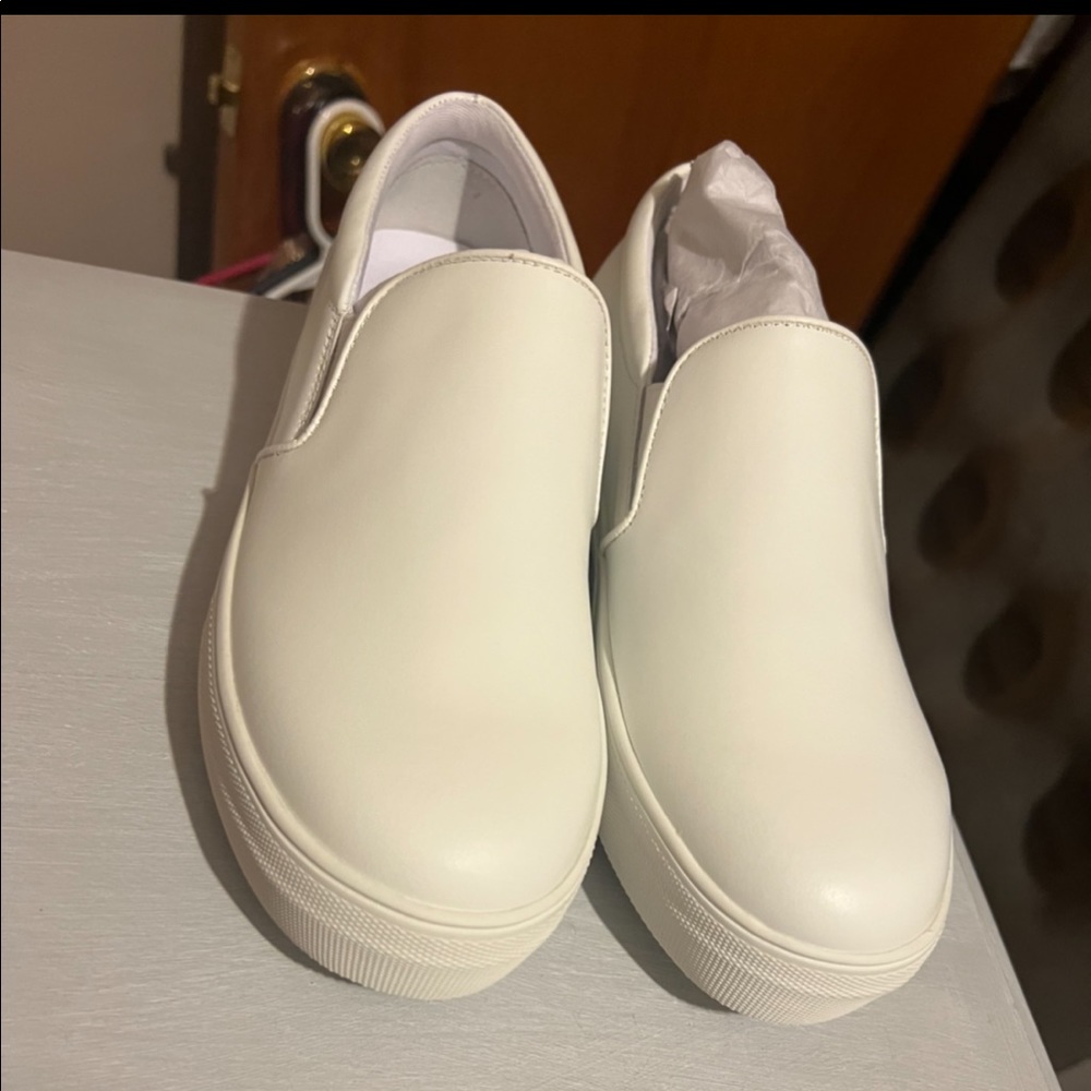 Steve Madden white leather gills slip on sneakers. Brand new in box.